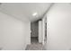 Walk-in closet with built-in shelving and carpeted flooring for organization at 2617 Fayetteville St, Durham, NC 27707