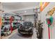 Spacious garage with car lift, storage solutions, and ample space for vehicles and equipment at 3034 Lewis Farm Rd, Raleigh, NC 27607