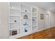 Bright living space with built in shelving, hardwood floors and traditional details at 3034 Lewis Farm Rd, Raleigh, NC 27607