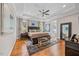 Spacious main bedroom with tray ceiling, ceiling fan, and ensuite bathroom at 3034 Lewis Farm Rd, Raleigh, NC 27607