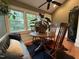 Cozy breakfast nook featuring a round wooden table, chairs, and bench seating at 313 W Noble St, Louisburg, NC 27549
