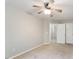 Bedroom with closet, a ceiling fan, neutral carpet and a bright window at 330 Gilman Ln # 109, Raleigh, NC 27610