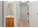 Bathroom and hallway with a partial view of the stairs with carpet flooring at 330 Gilman Ln # 109, Raleigh, NC 27610
