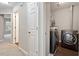Convenient laundry room featuring modern washer and dryer units, providing efficient laundry solutions at 330 Gilman Ln # 109, Raleigh, NC 27610