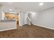 Hardwood floors in an open space leading to the kitchen and upstairs at 330 Gilman Ln # 109, Raleigh, NC 27610
