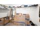 Spacious walk-in closet providing ample storage solutions with shelving and hanging space, plus moving boxes at 341 Henry Steel Dr, Gibsonville, NC 27249