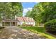 Charming home with a well-manicured lawn and beautiful trees at 3705 Old Post Rd, Raleigh, NC 27612