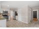 Kitchen features tile flooring, stainless steel appliances, and an eat-in breakfast area at 3705 Old Post Rd, Raleigh, NC 27612