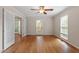 Spacious living room featuring hardwood floors and ample natural light at 3705 Old Post Rd, Raleigh, NC 27612