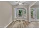 Cozy dining area features a bay window providing natural light, adjacent to the living room at 410 Oak Run Dr, Raleigh, NC 27606