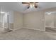 View of carpeted living room showing view through into other rooms at 410 Oak Run Dr, Raleigh, NC 27606