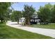 A long driveway leading to an outdoor gazebo at 4217 Grahamstone Rd, Raleigh, NC 27610
