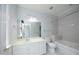 Bathroom featuring tub, toilet, and vanity sink at 4217 Grahamstone Rd, Raleigh, NC 27610