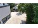 Aerial view of driveway, covered patio, and three-car garage at 4217 Grahamstone Rd, Raleigh, NC 27610