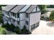 Aerial view of the side of the home with garage and an outdoor patio at 4217 Grahamstone Rd, Raleigh, NC 27610