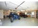 This spacious garage features ample storage, epoxy flooring, and room for multiple vehicles and recreational toys at 4217 Grahamstone Rd, Raleigh, NC 27610