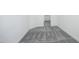 Neutral hallway with grey carpet and leading to other rooms at 4217 Grahamstone Rd, Raleigh, NC 27610