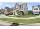 Charming two-story home featuring manicured lawn and neutral siding, complemented by a one car garage at 511 Kenton Mill Ct, Rolesville, NC 27571