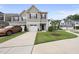 A charming exterior view reveals a well-maintained lawn and a convenient one-car garage at 511 Kenton Mill Ct, Rolesville, NC 27571