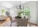 Bright dining space and cozy living room, perfect for intimate dinners and entertaining guests with style and comfort at 522 Johnson St, Garner, NC 27529