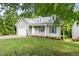 Charming single-story home with a well-manicured front yard and attached garage at 522 Johnson St, Garner, NC 27529