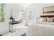 Bright primary bedroom with natural light, white walls, and decorative accents at 522 Johnson St, Garner, NC 27529