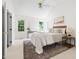 Bright, spacious main bedroom with vaulted ceiling, large windows, and classic furnishings, offering a peaceful retreat at 522 Johnson St, Garner, NC 27529