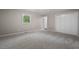 Neutral bedroom with carpet, closet and natural light from a window at 5414 Ventoria Rd, Durham, NC 27712