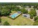 Aerial view of a community pool with lounge chairs and plenty of green space at 5712 Turner Store Ln, Raleigh, NC 27603