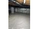 Bright basement featuring clean, white vapor barrier, insulated walls, and visible utilities at 5712 Turner Store Ln, Raleigh, NC 27603