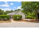 Community clubhouse surrounded by lush greenery offering recreational space for residents at 5712 Turner Store Ln, Raleigh, NC 27603