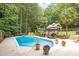 Refreshing pool and outdoor patio area for summer relaxation and entertainment at 5712 Turner Store Ln, Raleigh, NC 27603