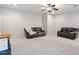 Finished basement with comfortable seating and entertainment area at 7906 Longleaf Branch Ct, Raleigh, NC 27612