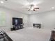 Finished basement with comfortable seating and entertainment area at 7906 Longleaf Branch Ct, Raleigh, NC 27612