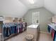 Walk-in closet offers ample hanging space and custom storage solutions at 7906 Longleaf Branch Ct, Raleigh, NC 27612