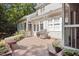 Relaxing backyard deck featuring a grill, outdoor seating, and lush greenery at 8004 Gabriels Bend Dr, Raleigh, NC 27612