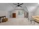 Bright bonus room with ample space, featuring neutral carpet, a window, and cozy seating at 8004 Gabriels Bend Dr, Raleigh, NC 27612
