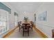 Formal dining room with hardwood floors, chandelier, and elegant decor creating a cozy atmosphere at 8004 Gabriels Bend Dr, Raleigh, NC 27612