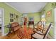 Charming living room with hardwood floors, traditional furniture and French doors at 8004 Gabriels Bend Dr, Raleigh, NC 27612