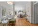 Open-concept living room featuring a fireplace and access to the dining room at 8004 Gabriels Bend Dr, Raleigh, NC 27612