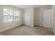 Bedroom with neutral paint, windows and closet at 809 Valerie Dr, Raleigh, NC 27606