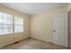 This bedroom features dual windows, plush carpet and a bright interior at 809 Valerie Dr, Raleigh, NC 27606