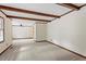 Spacious living room featuring light-colored walls, new carpeting, and natural light with wood trim at 809 Valerie Dr, Raleigh, NC 27606