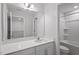 Bathroom with a white vanity and a large mirror at 815 Harmony Ranch Ln, Franklinton, NC 27525