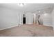 Large bonus room with plush carpeting, storage, and natural light at 815 Harmony Ranch Ln, Franklinton, NC 27525