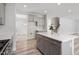 Kitchen features light countertops, large island, stainless steel appliances and recessed lighting at 815 Harmony Ranch Ln, Franklinton, NC 27525