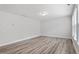Spacious living room with luxury vinyl flooring and abundant natural light at 815 Harmony Ranch Ln, Franklinton, NC 27525
