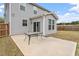 This patio offers a concrete slab, outdoor seating, and grassy areas around the home at 815 Harmony Ranch Ln, Franklinton, NC 27525