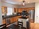 Spacious kitchen boasts stainless steel appliances, granite countertops, and ample cabinet space at 8600 Colville Ct, Raleigh, NC 27617