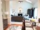 Open floor plan connects the living room to the dining area, creating an inviting space for living and entertaining at 8600 Colville Ct, Raleigh, NC 27617